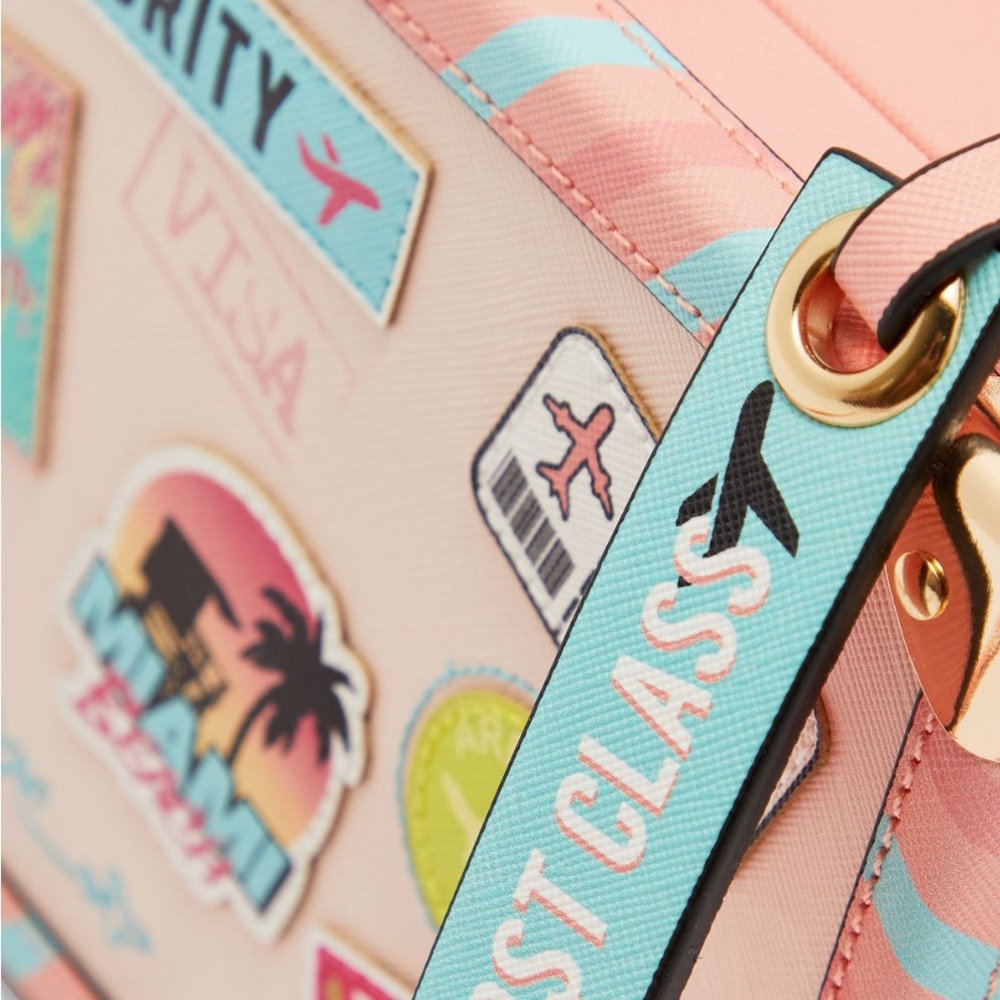 Stylish Travel-Themed Handbag with Pink and Blue Accents - Picture 5 of 10